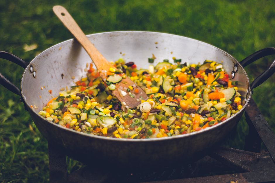 golden zucchini rice patties frying pan herbs