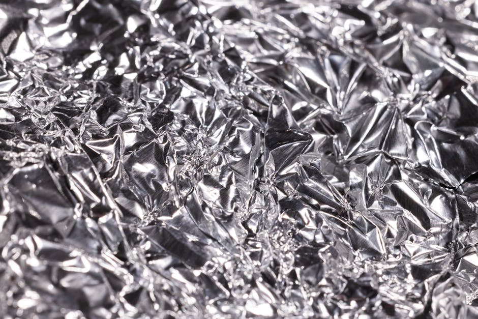 aluminum foil wrapped fish vegetables baking tray oven