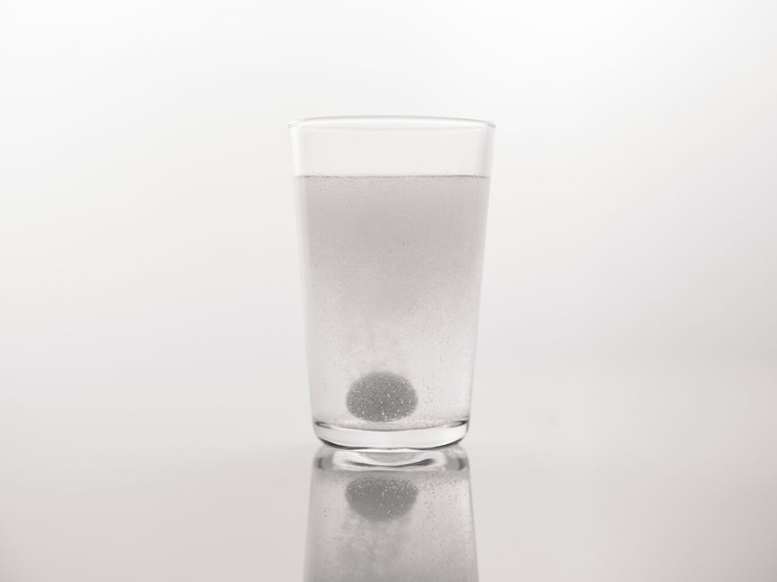 chicken bouillon cube dissolving in hot water