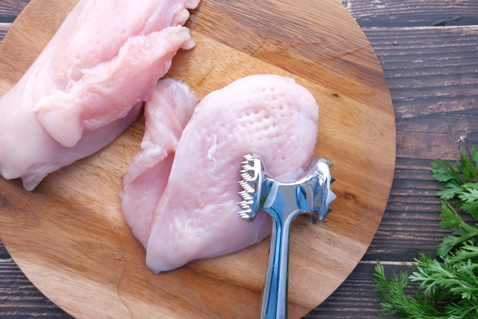 chicken cutlets raw preparation cutting board