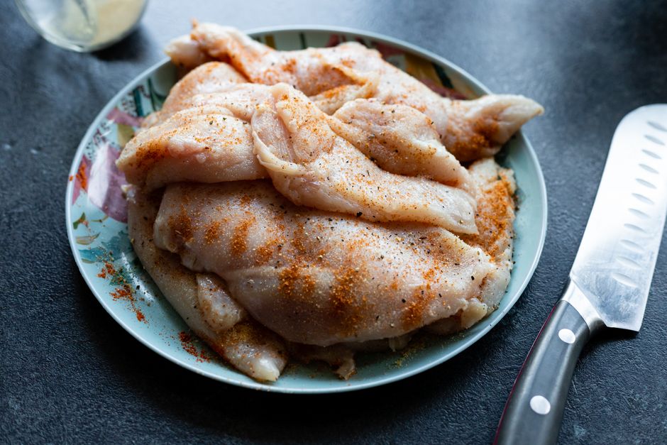 raw chicken breast with paprika vegetables in oven bag