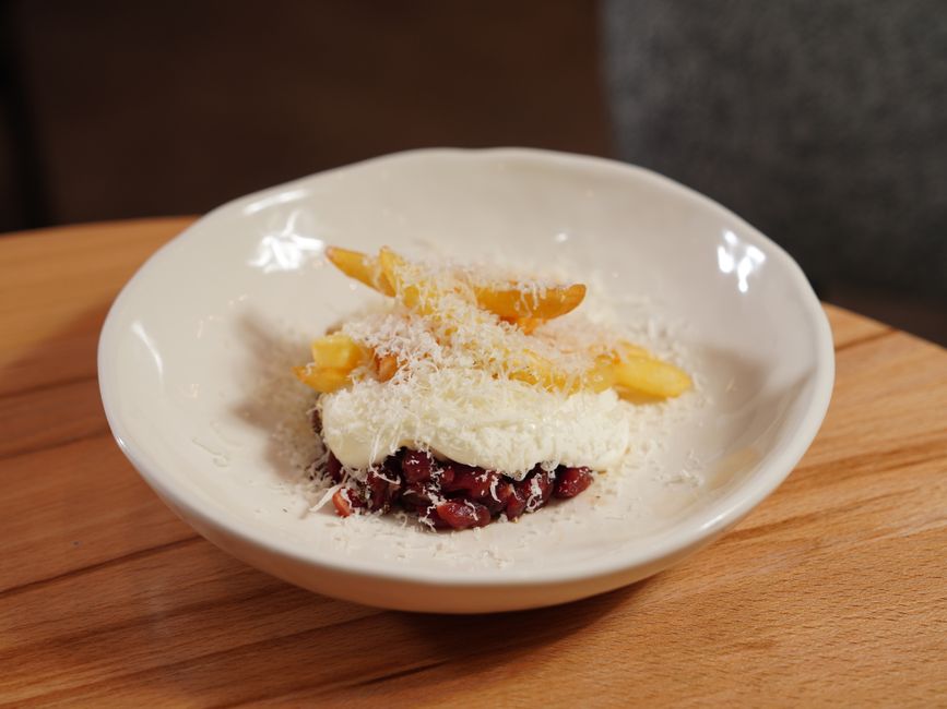 grated potatoes squeezing cheesecloth bowl