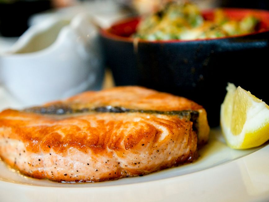 pan seared trout fillet golden brown plated