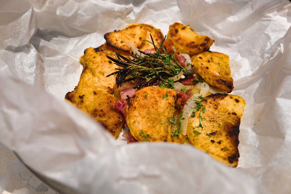 golden baked sausages potatoes herbs oven