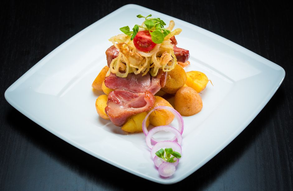 traditional polish silesian kluski with bacon and onion