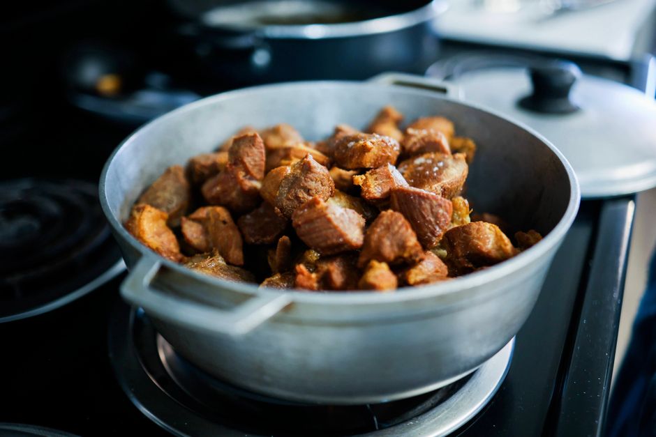 beef chuck stew meat browning in pot
