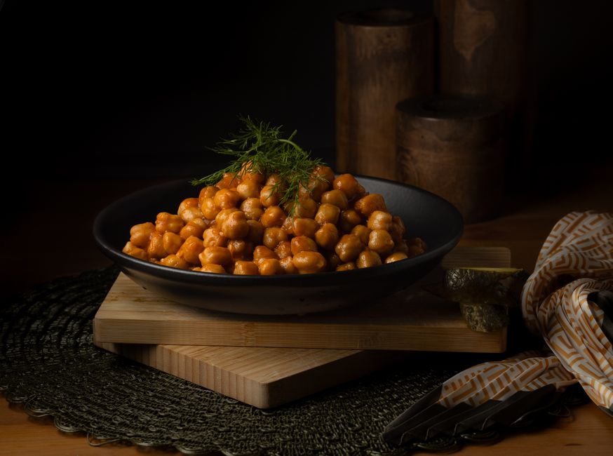 canned chickpeas in bowl with ingredients