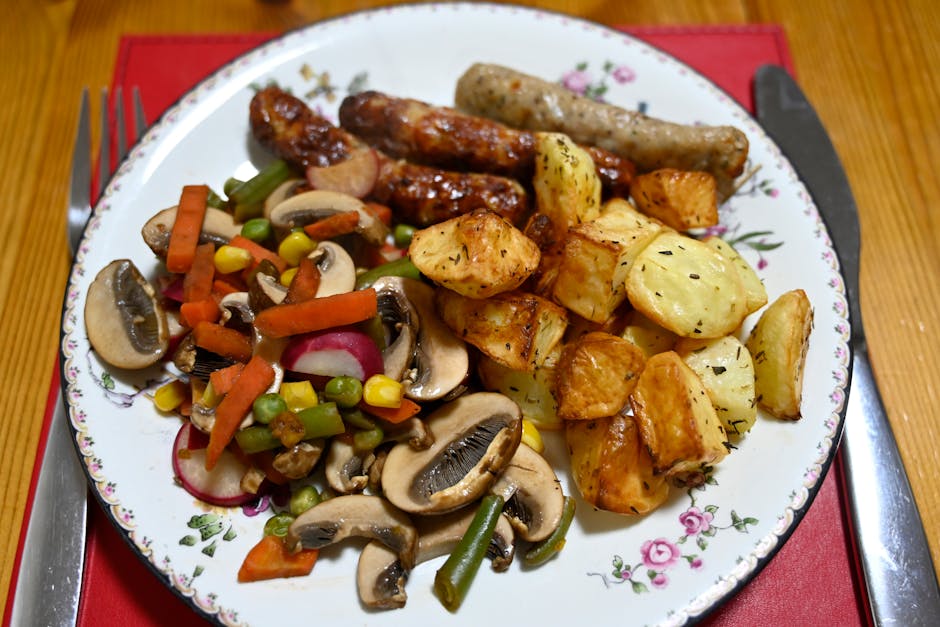 polish sausage dish with vegetables on plate