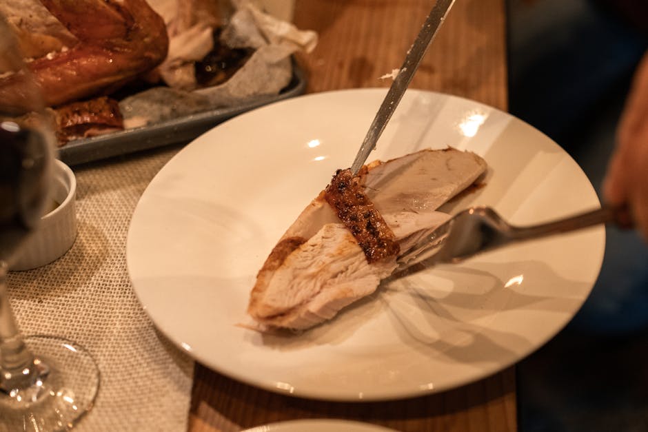 roasted ham golden brown crispy skin sliced dinner table