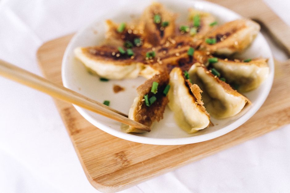 fried onions and mushroom sauce with dumplings
