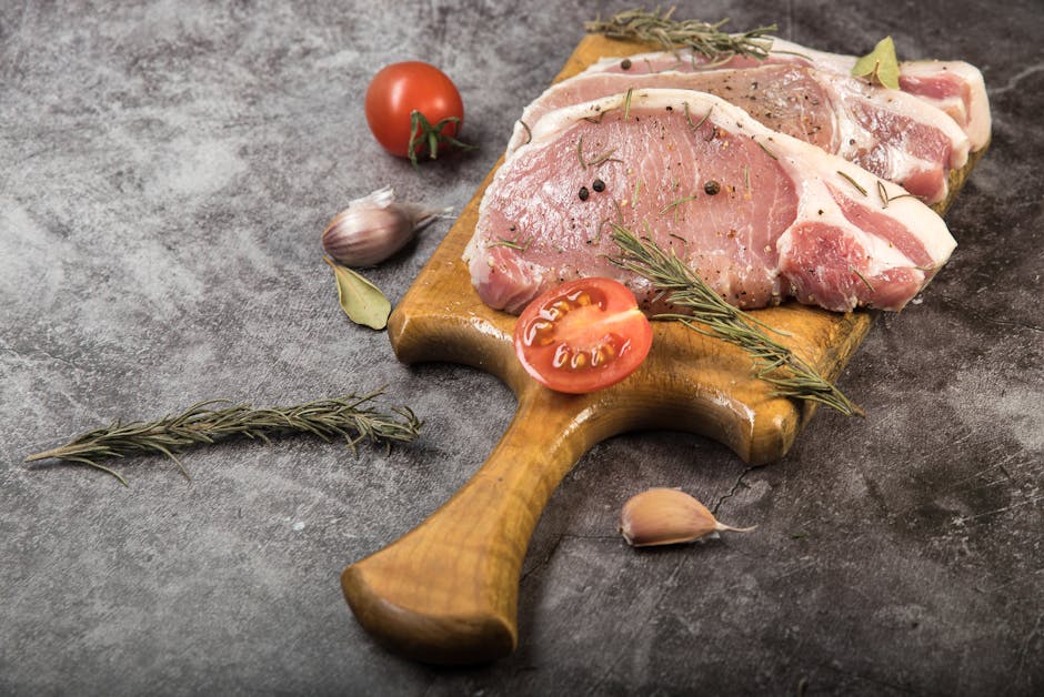 fresh pork ham raw meat with spices herbs preparation