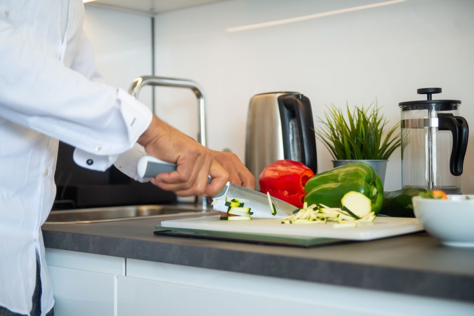 chopped bell peppers and zucchini on cutting board