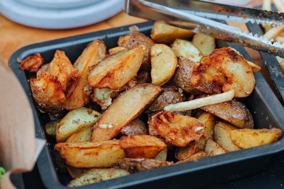 roasted pork potatoes golden brown baking tray