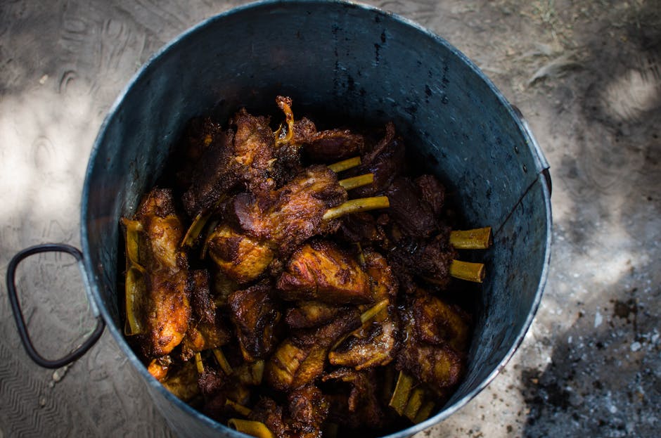 pork ribs cooking in pot with spices