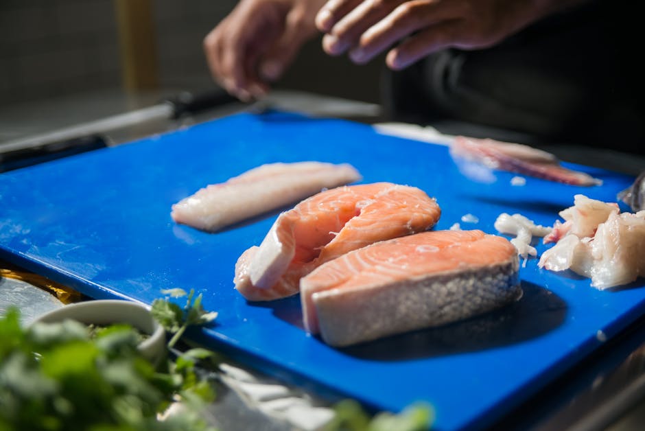frozen fish fillets on cutting board kitchen