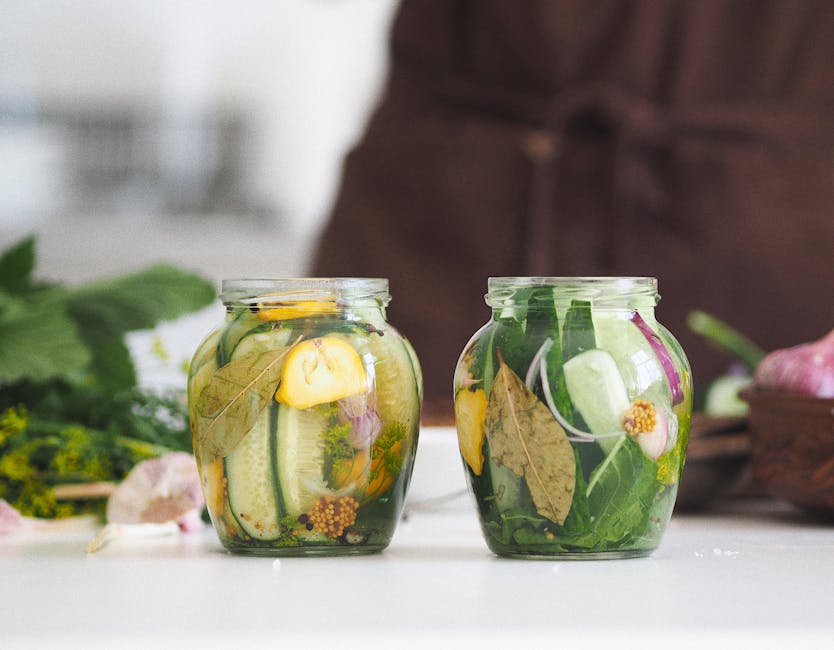 marinated herring in glass jar with onions