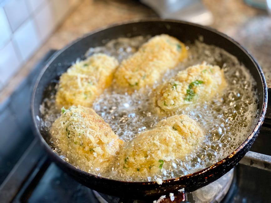golden crispy oat patties frying pan